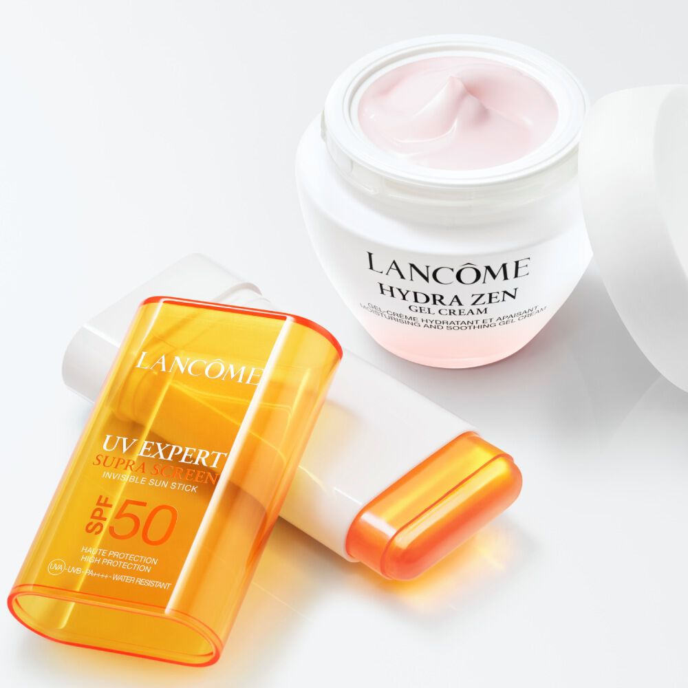 packshot of UV EXPERT SUPRA SCREEN INVISIBLE SUN STICK SPF 50 and Hydra Zen day cream packshot