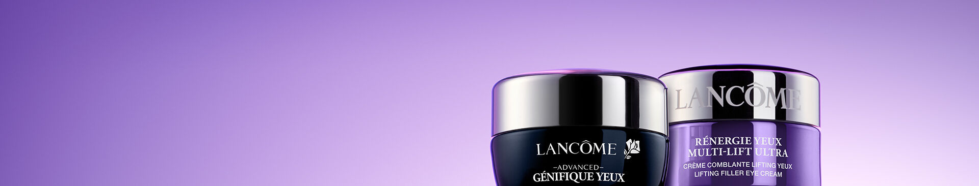 Two jars of Lancome skincare products on a purple background. The jars are labeled "Advanced Genifique" and "Renergie Multi-Lift."