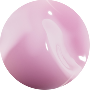 Un cerchio di vernice rosa con una finitura lucida, sfumature morbide e un aspetto satinato.