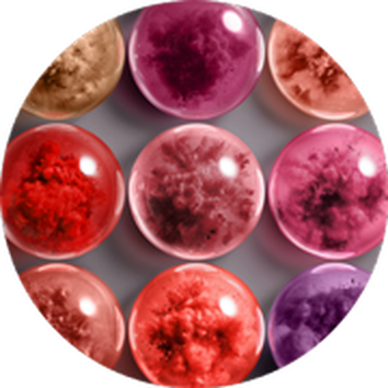 Cerchi colorati di varie sfumature che rappresentano sostanze vibrazionali in un contesto scientifico.