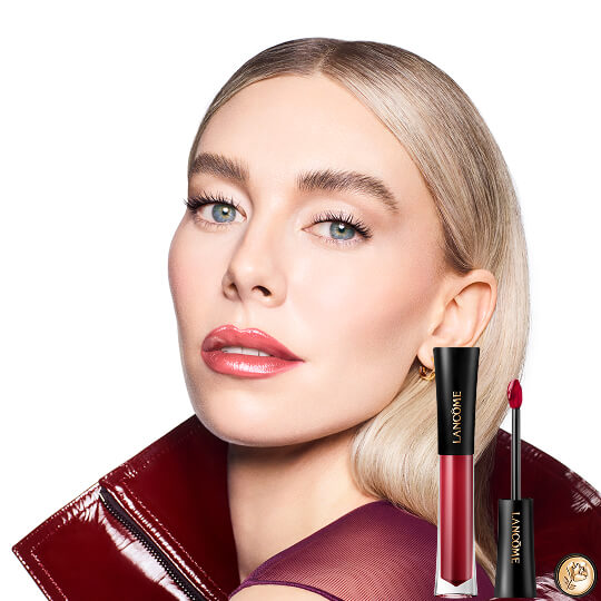 Lip closeup of a woman wearing the 706 shade of Glaze Tintation. 